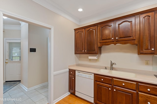 6375 Darren Dr, Olive Branch, MS 38654 - kitchen featuring white dishwasher, a sink, crown molding, light countertops, and baseboards