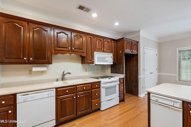 6375 Darren Dr, Olive Branch, MS 38654 - kitchen featuring white appliances, a sink, light wood-style floors, light countertops, and ornamental molding