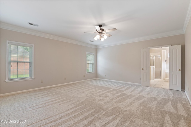 6375 Darren Dr, Olive Branch, MS 38654 - spare room with crown molding, light colored carpet, plenty of natural light, a ceiling fan, and baseboards