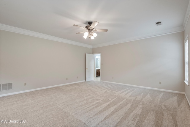 6375 Darren Dr, Olive Branch, MS 38654 - empty room featuring crown molding, ceiling fan, light carpet, and baseboards