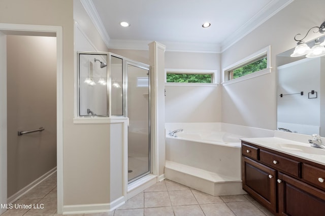6375 Darren Dr, Olive Branch, MS 38654 - bathroom featuring a shower stall, a garden tub, tile patterned flooring, ornamental molding, and vanity
