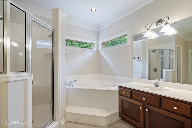 6375 Darren Dr, Olive Branch, MS 38654 - full bath featuring ornamental molding, a shower stall, a garden tub, vanity, and tile patterned floors