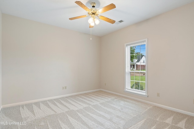 6375 Darren Dr, Olive Branch, MS 38654 - unfurnished room featuring light colored carpet, baseboards, and ceiling fan
