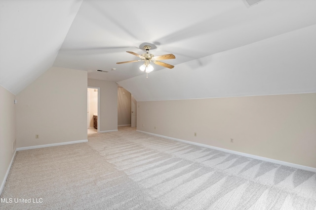 6375 Darren Dr, Olive Branch, MS 38654 - additional living space featuring lofted ceiling, light carpet, a ceiling fan, and baseboards