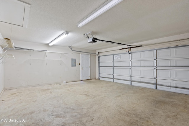 6375 Darren Dr, Olive Branch, MS 38654 - garage with a garage door opener and electric panel