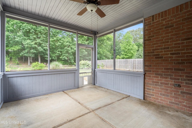 6375 Darren Dr, Olive Branch, MS 38654 - unfurnished sunroom with ceiling fan and view of scattered trees