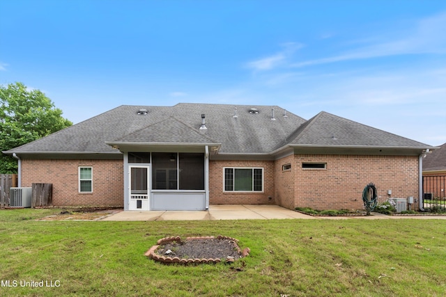 6375 Darren Dr, Olive Branch, MS 38654 - rear view of property featuring a sunroom, a patio, brick siding, and cooling unit