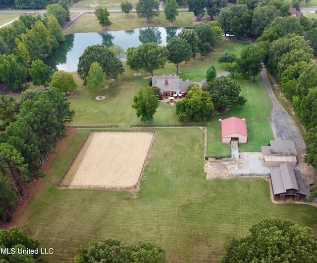 drone / aerial view with a water view and a rural view