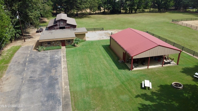 birds eye view of property featuring a rural view