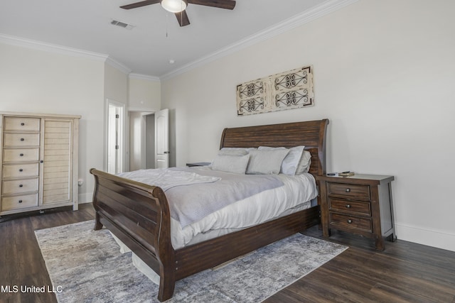 bedroom featuring dark hardwood / wood-style floors, ceiling fan, and ornamental molding