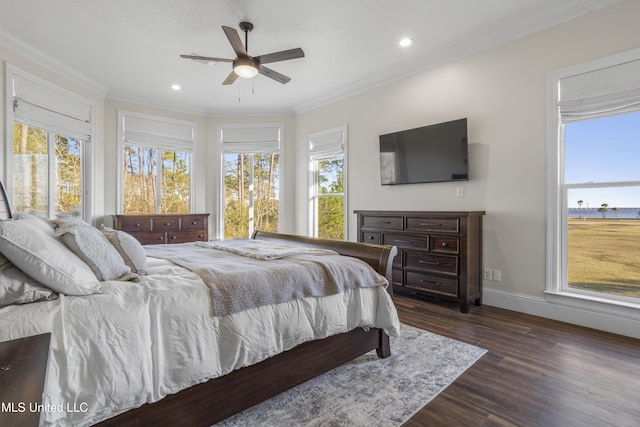 bedroom featuring multiple windows, ceiling fan, crown molding, and dark hardwood / wood-style floors