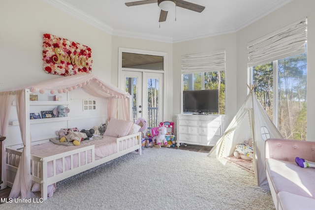 sunroom / solarium with ceiling fan and french doors