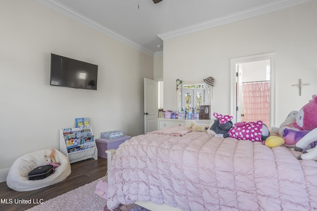 bedroom with ensuite bath, crown molding, and dark hardwood / wood-style floors