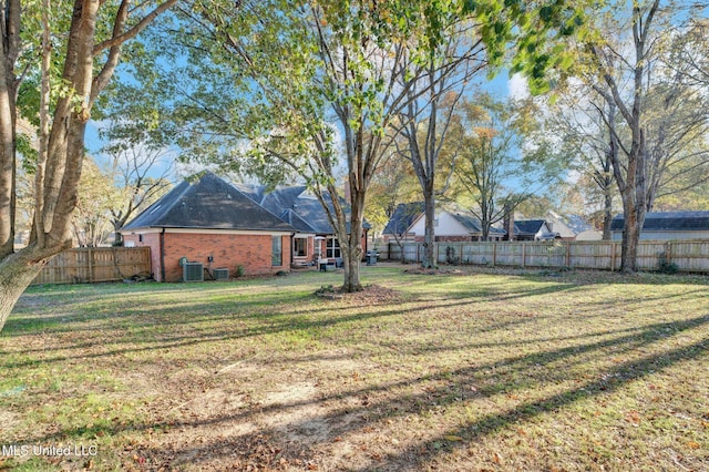 view of yard featuring central AC