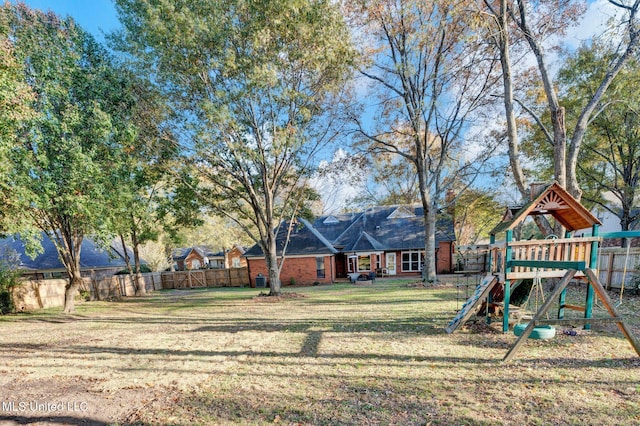 view of yard featuring a playground