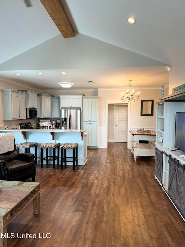 interior space with a chandelier, ornamental molding, lofted ceiling with beams, and dark wood-type flooring