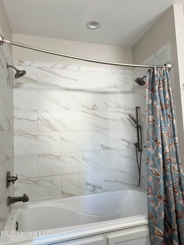 bathroom featuring shower / tub combo