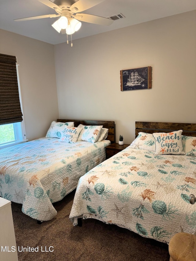 bedroom featuring carpet flooring and ceiling fan