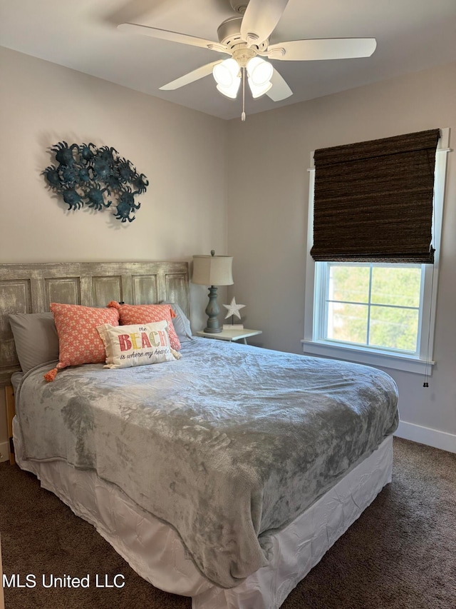 carpeted bedroom with ceiling fan