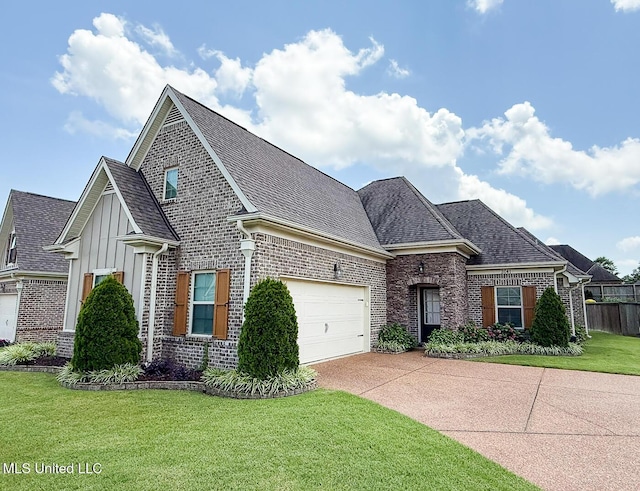 3041 Brambleberry Cv, Southaven, MS 38672 - view of front of property featuring brick siding, driveway, a garage, and roof with shingles
