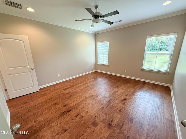 3041 Brambleberry Cv, Southaven, MS 38672 - spare room featuring ornamental molding, ceiling fan, wood finished floors, and recessed lighting