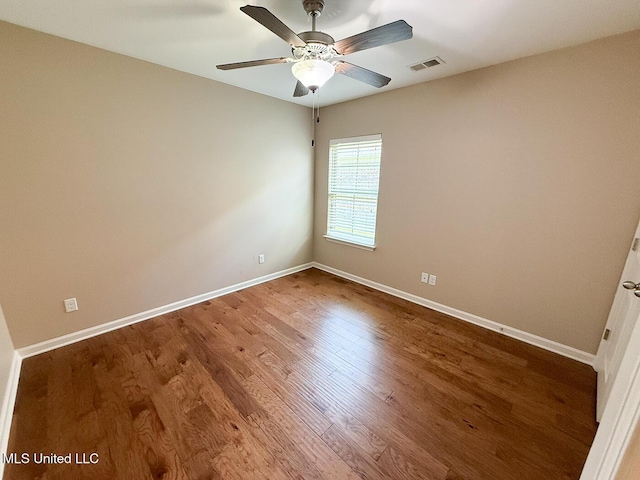 3041 Brambleberry Cv, Southaven, MS 38672 - unfurnished room with wood finished floors and ceiling fan