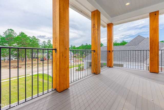 deck featuring a lawn