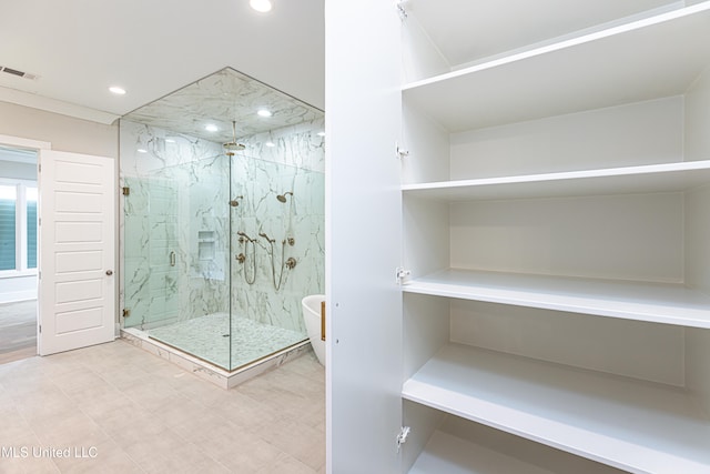 bathroom featuring an enclosed shower