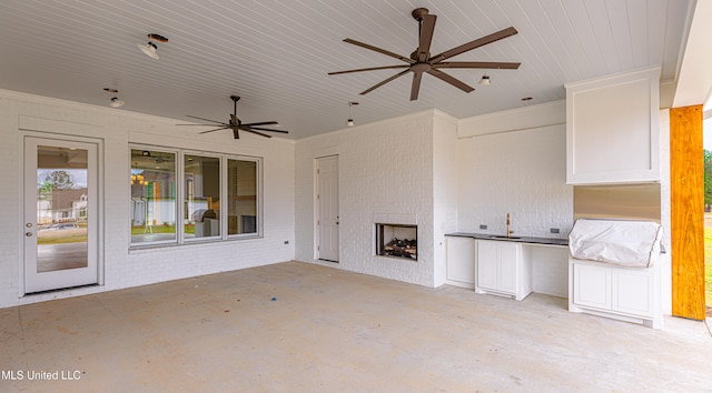 view of patio with ceiling fan