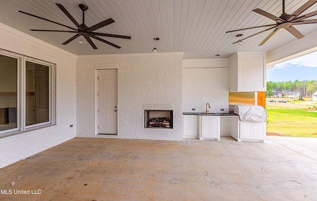 view of patio / terrace with ceiling fan