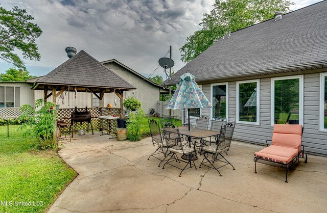 218 Harbor Ln, Brandon, MS 39047 - view of patio featuring a gazebo and outdoor dining area