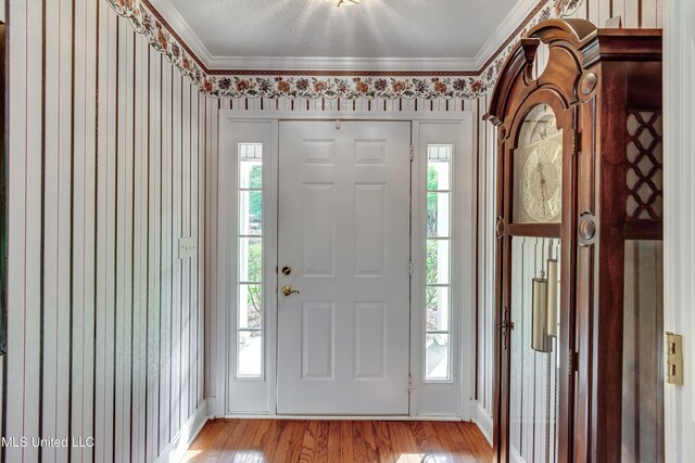 218 Harbor Ln, Brandon, MS 39047 - foyer entrance with crown molding, light wood finished floors, and baseboards