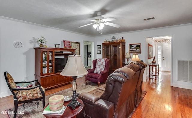 218 Harbor Ln, Brandon, MS 39047 - living area with a ceiling fan, light wood-style floors, ornamental molding, and baseboards
