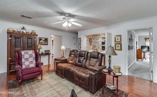 218 Harbor Ln, Brandon, MS 39047 - living room with wood finished floors, ceiling fan, ornamental molding, and baseboards