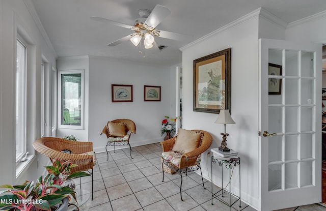 218 Harbor Ln, Brandon, MS 39047 - living area featuring ornamental molding, a ceiling fan, light tile patterned floors, and baseboards
