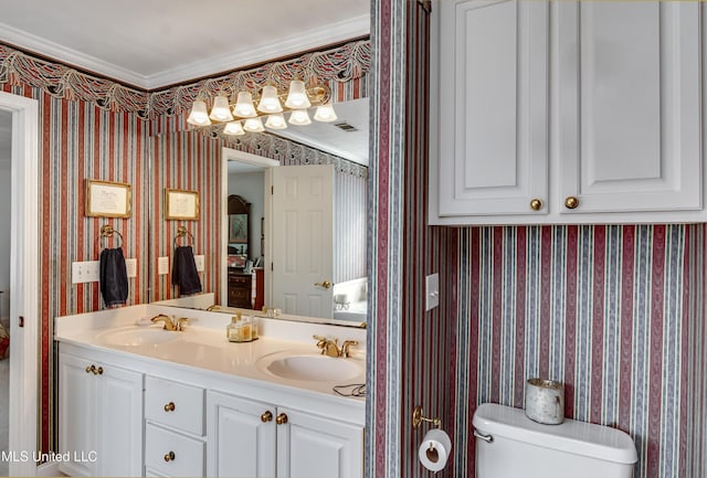 218 Harbor Ln, Brandon, MS 39047 - bathroom with wallpapered walls, toilet, ornamental molding, and double vanity