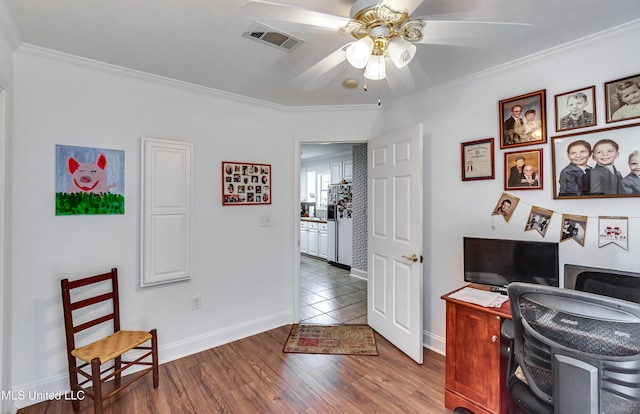 218 Harbor Ln, Brandon, MS 39047 - home office with a ceiling fan, ornamental molding, baseboards, and wood finished floors