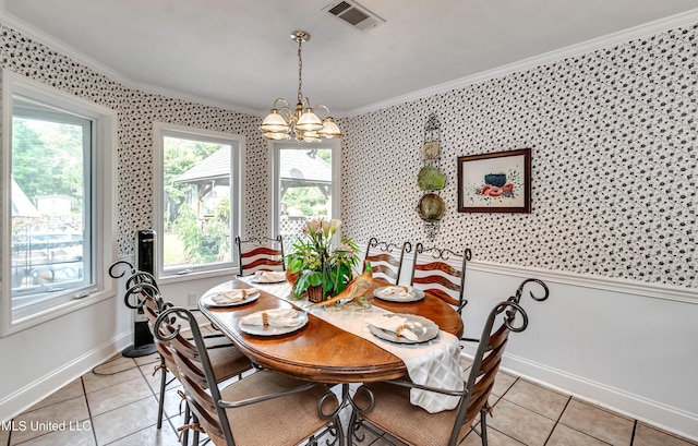 218 Harbor Ln, Brandon, MS 39047 - dining room featuring crown molding, light tile patterned floors, a chandelier, baseboards, and wallpapered walls