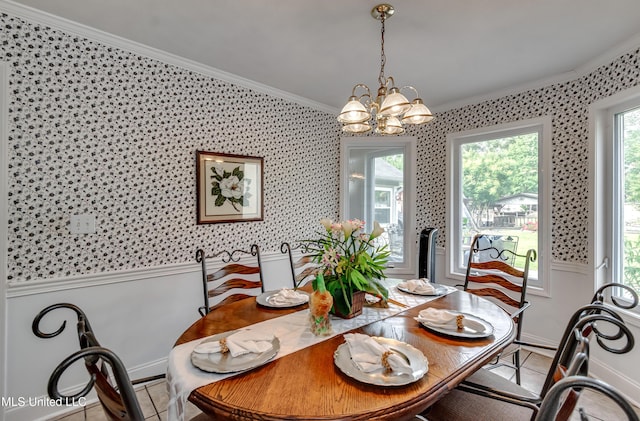 218 Harbor Ln, Brandon, MS 39047 - tiled dining room with ornamental molding, a chandelier, wallpapered walls, a wainscoted wall, and baseboards