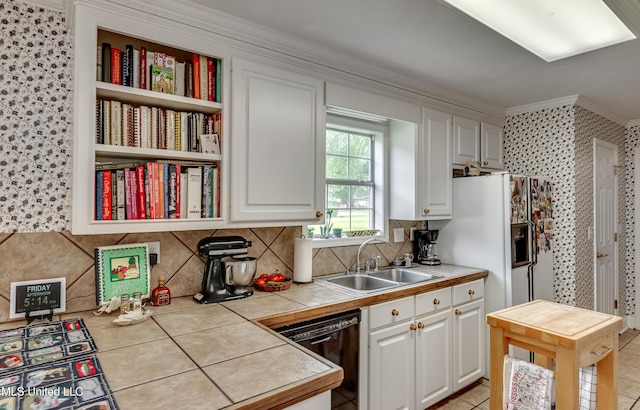 218 Harbor Ln, Brandon, MS 39047 - kitchen featuring a sink, dishwasher, ornamental molding, wallpapered walls, and white cabinets