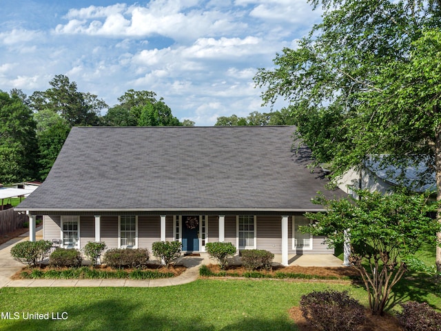218 Harbor Ln, Brandon, MS 39047 - view of front of home with covered porch, a front lawn, and roof with shingles