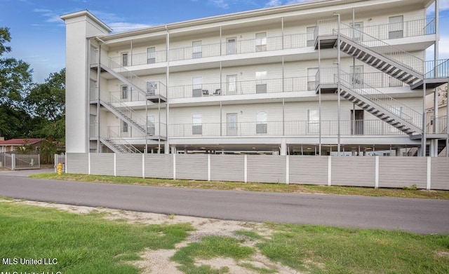 183 Mcdonnell Ave Unit 305, Biloxi, MS 39531 - view of building exterior featuring stairs
