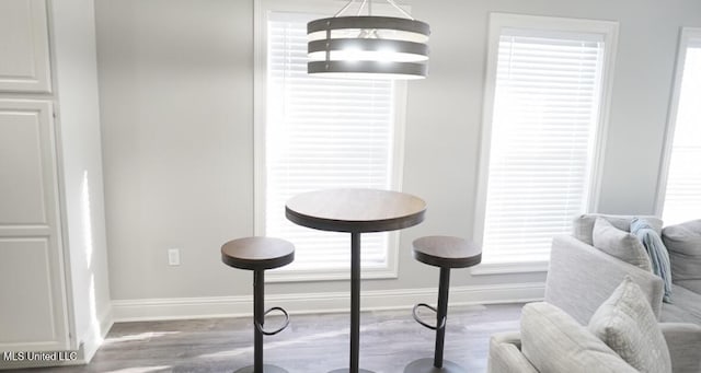 183 Mcdonnell Ave Unit 305, Biloxi, MS 39531 - dining space with wood finished floors and baseboards