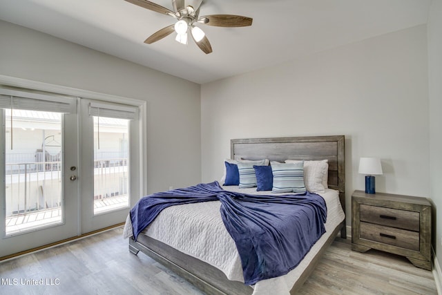 183 Mcdonnell Ave Unit 305, Biloxi, MS 39531 - bedroom featuring french doors, access to outside, wood finished floors, and a ceiling fan