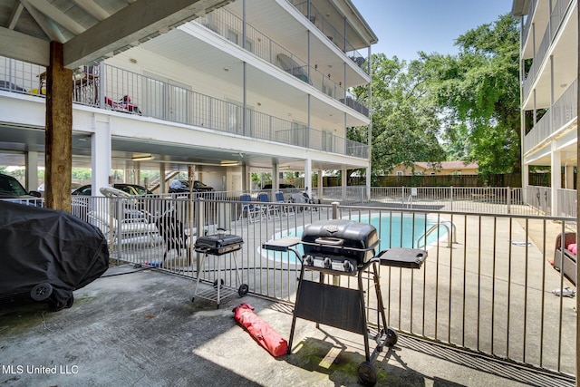 183 Mcdonnell Ave Unit 305, Biloxi, MS 39531 - view of pool with a grill and a patio area