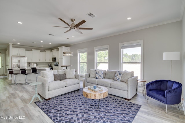 183 Mcdonnell Ave Unit 305, Biloxi, MS 39531 - living area with light wood finished floors, ornamental molding, a ceiling fan, and recessed lighting