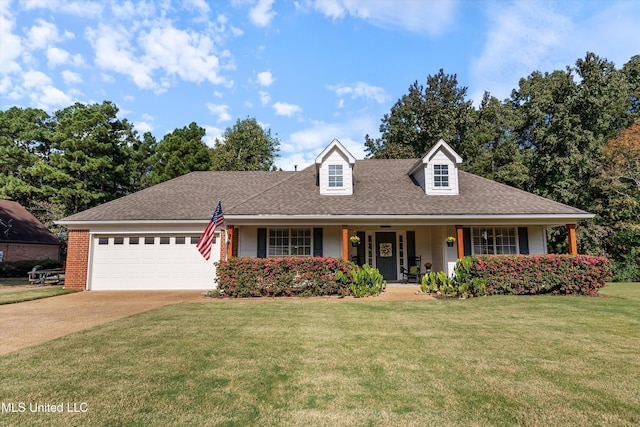 9948 Victor Dr, Olive Branch, MS 38654 - cape cod house with a front lawn, a porch, an attached garage, a shingled roof, and concrete driveway
