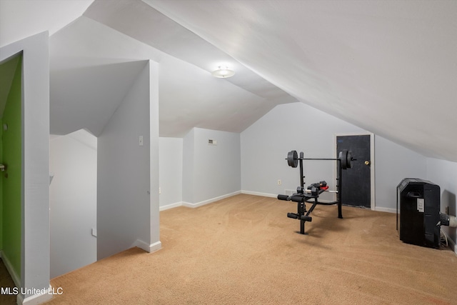 9948 Victor Dr, Olive Branch, MS 38654 - exercise room featuring carpet, lofted ceiling, and baseboards