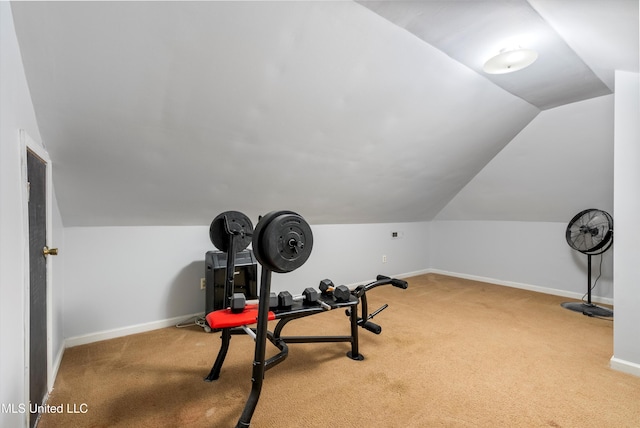 9948 Victor Dr, Olive Branch, MS 38654 - workout area with carpet flooring, vaulted ceiling, and baseboards