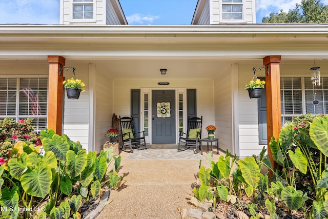 9948 Victor Dr, Olive Branch, MS 38654 - doorway to property with covered porch